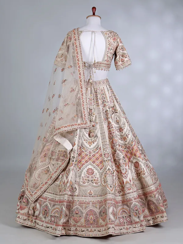 Peach raw silk sweetheart lehenga choli ensemble