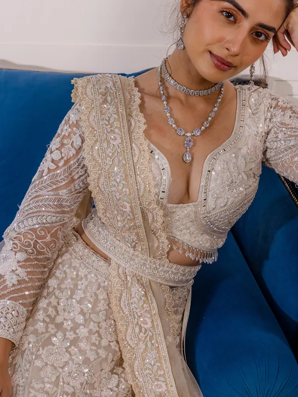 Peach reception wear lehenga choli in soft net