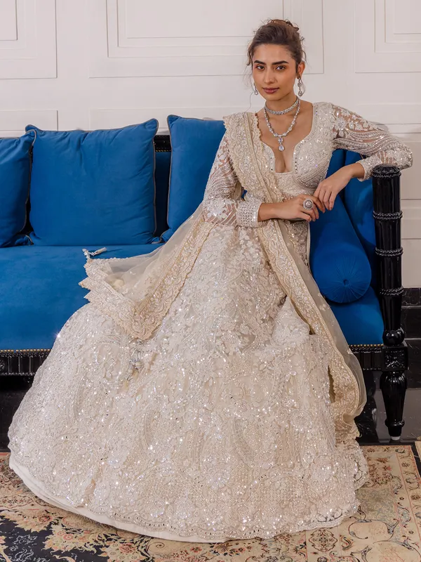 Peach reception wear lehenga choli in soft net