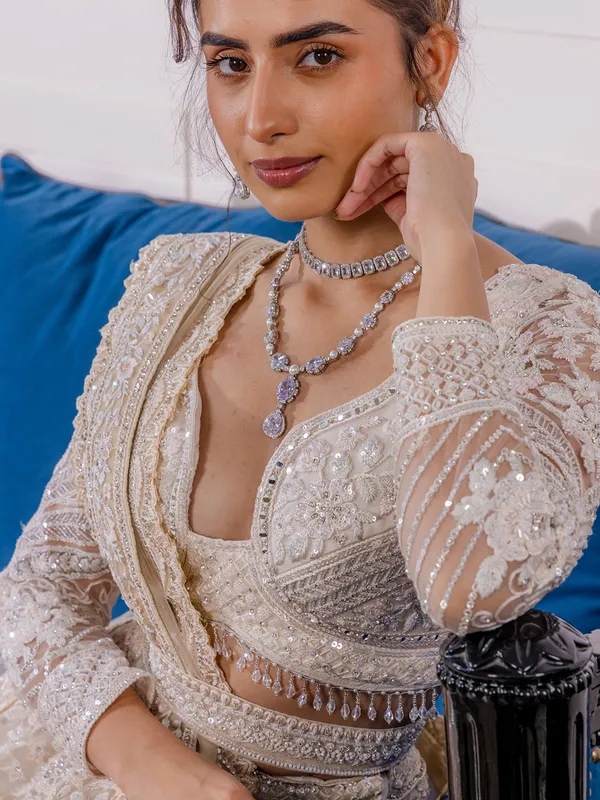 Peach reception wear lehenga choli in soft net
