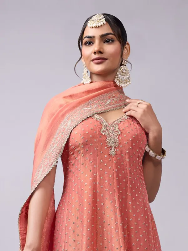 Peach silk anarkali suit for festive celebration