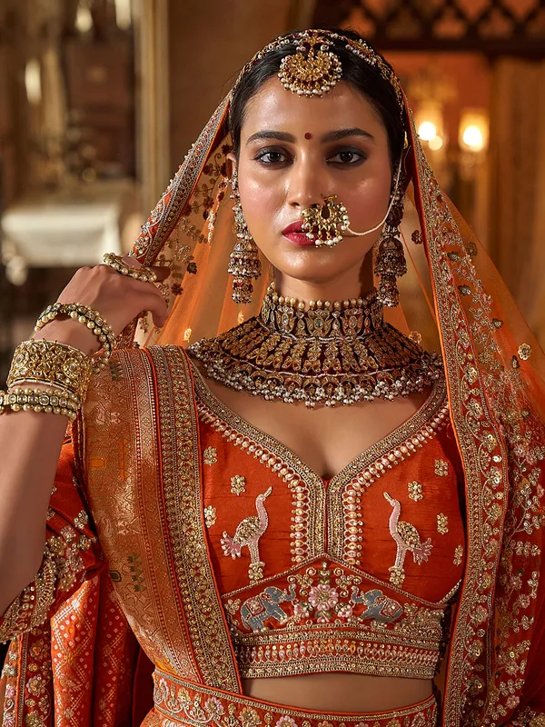 Peach silk bridal lehenga choli with two dupatta