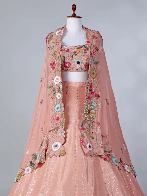 Peach silk designer lehenga choli with shrug