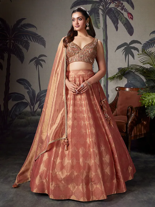 Peach silk lehenga choli for wedding celebration
