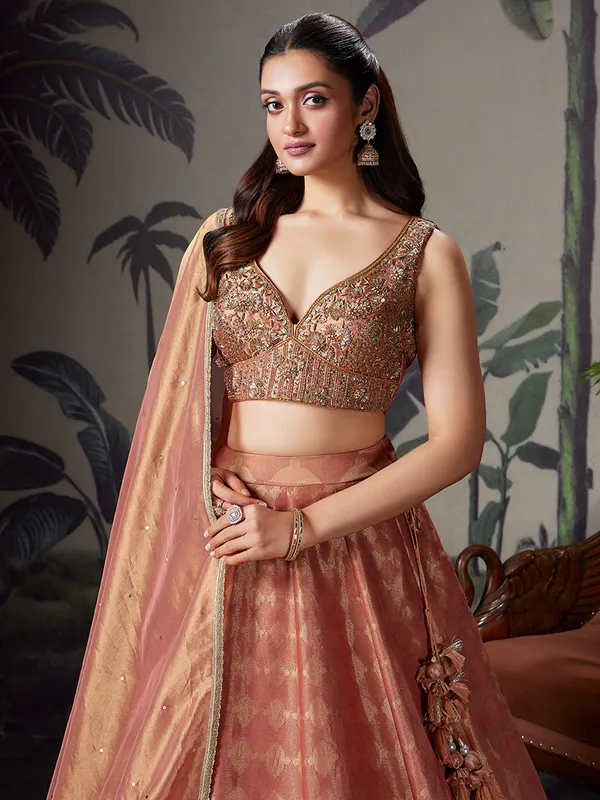 Peach silk lehenga choli for wedding celebration