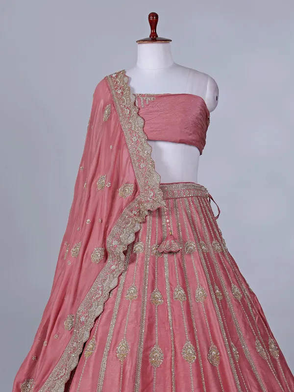 Peach silk lehenga choli resham and cutdana detailing