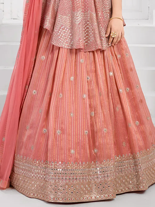 Peach silk lehenga choli with sequins and bead embroidery