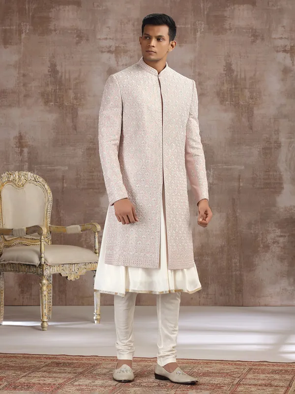 Peach silk peshwai sherwani with graceful accents