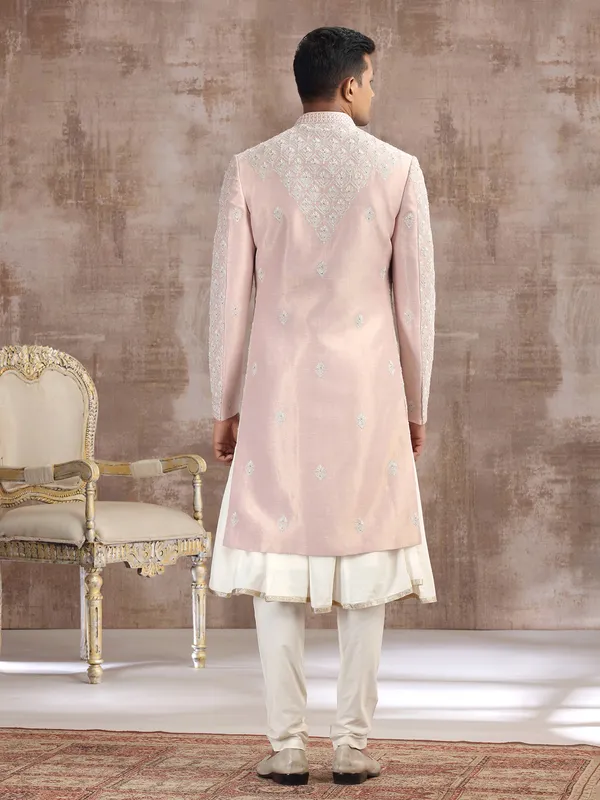 Peach silk peshwai sherwani with graceful accents