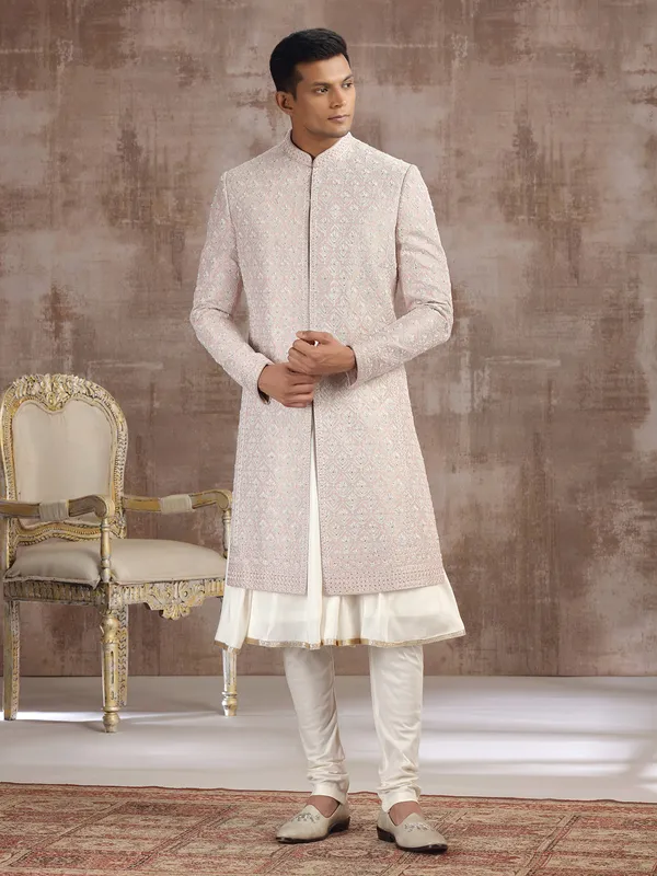 Peach silk peshwai sherwani with graceful accents