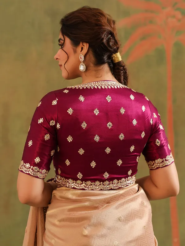 Peach silk saree with bold brown blouse wedding wear