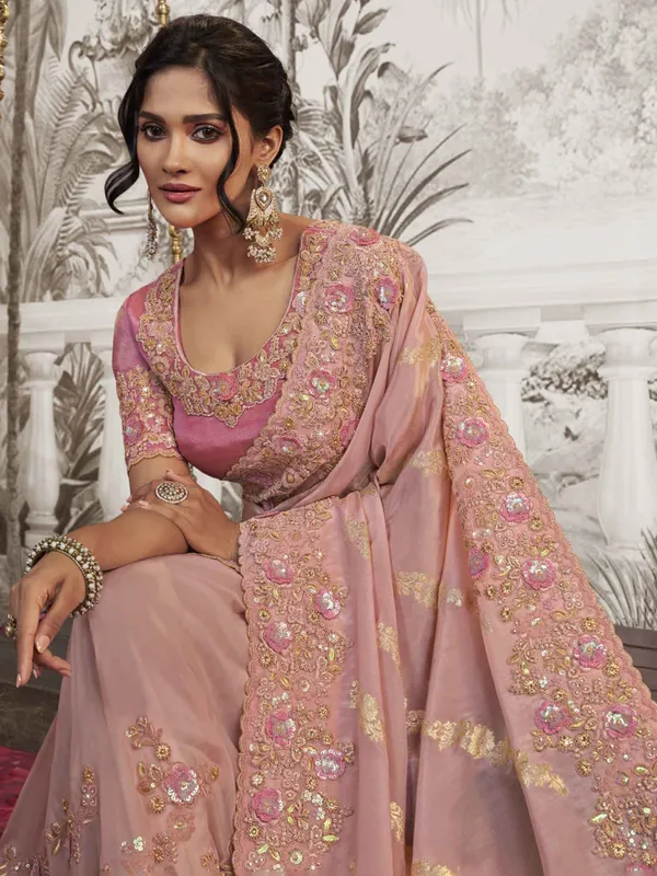 Peach silk saree with zari embellishment