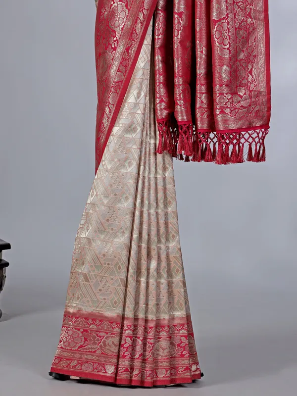 Peach tissue silk saree with contrast border