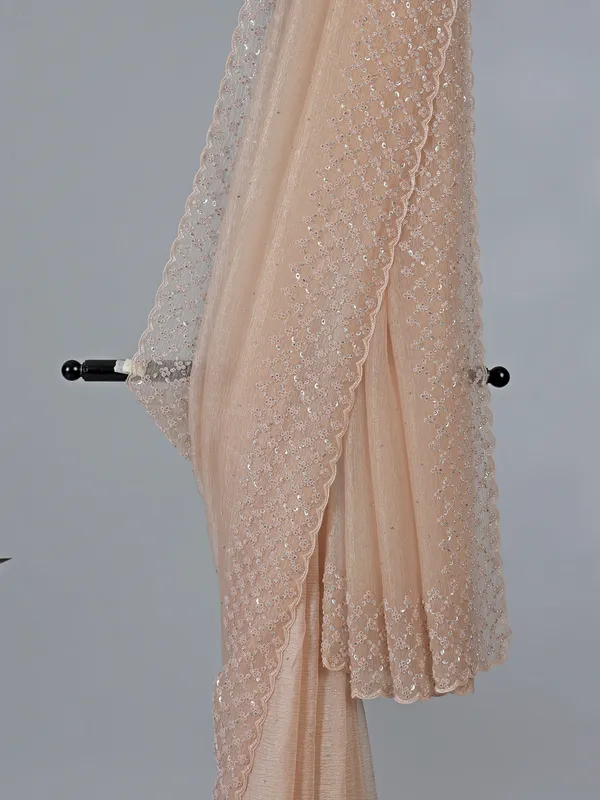 Peach tissue silk saree with diamond work