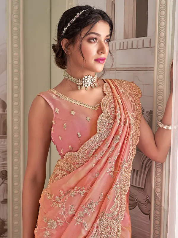 Peach tissue silk saree with embellishments