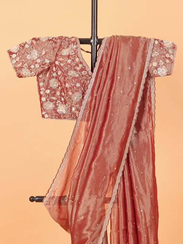 Peach tissue silk saree with ready made blouse