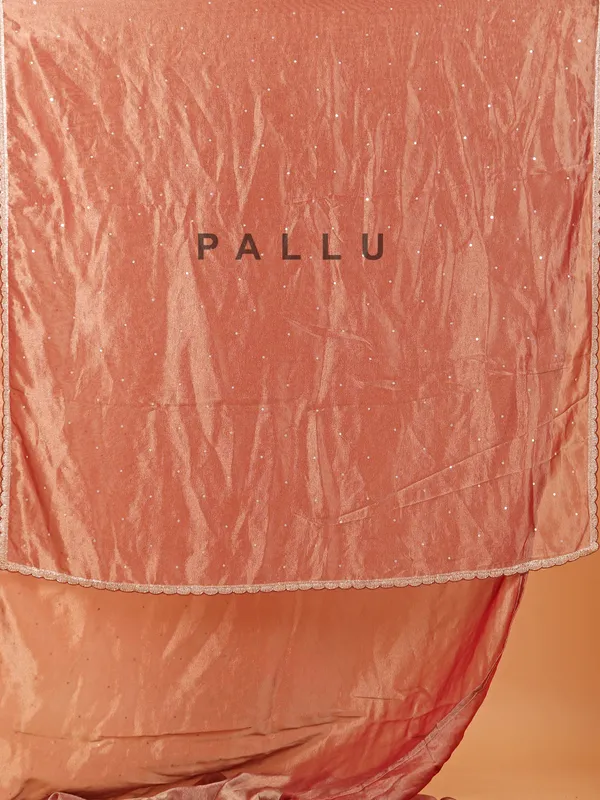 Peach tissue silk saree with ready made blouse