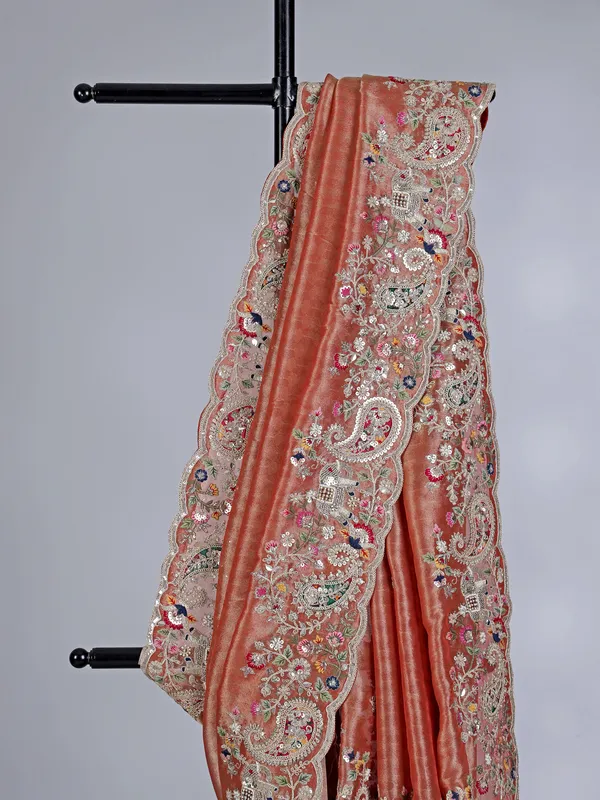 Peach tissue silk saree with zardosi and bead embellishments