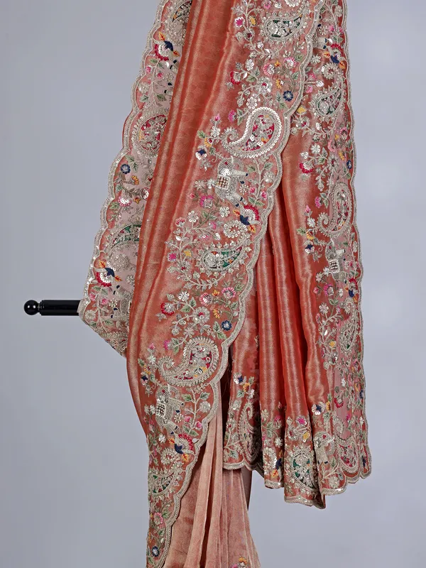Peach tissue silk saree with zardosi and bead embellishments