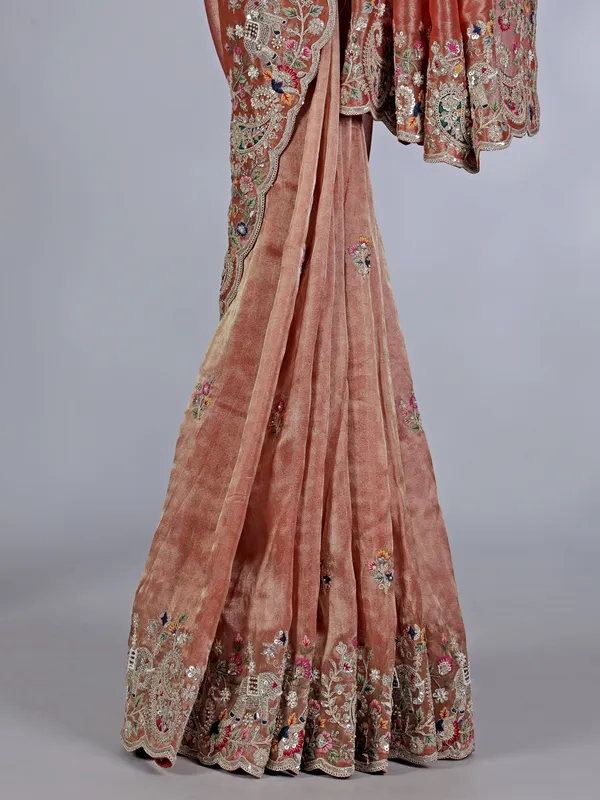 Peach tissue silk saree with zardosi and bead embellishments