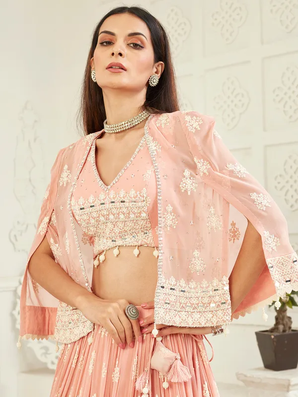 Peach wedding wear georgette lehenga choli with jacket