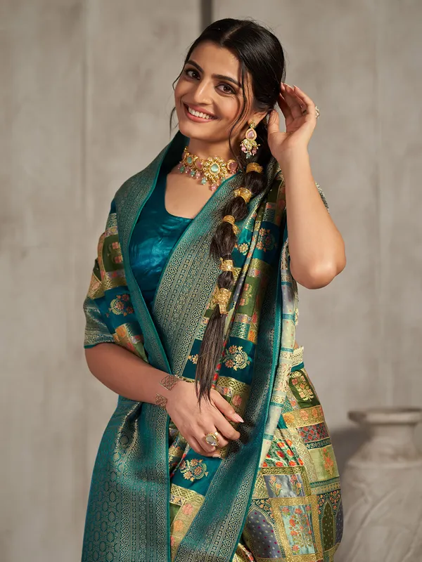 Peacock green silk minakari saree