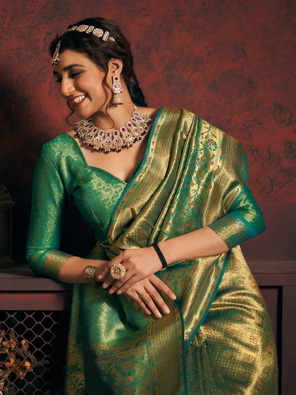 Peacock green silk zari weaving saree