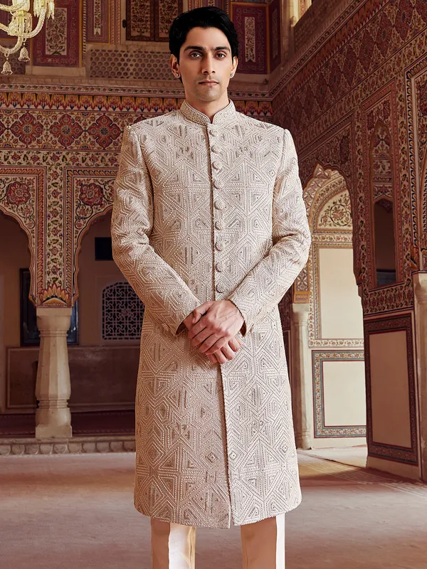 Peshwai style light peach sherwani for groom