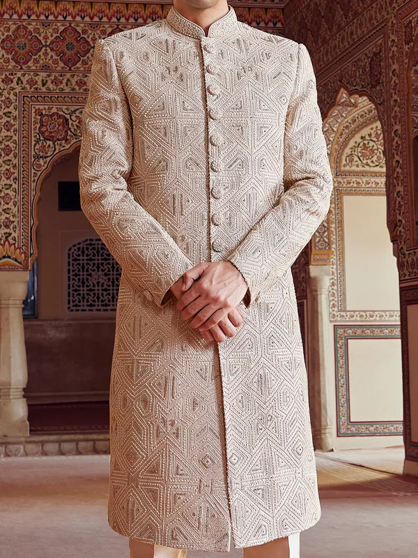 Peshwai style light peach sherwani for groom