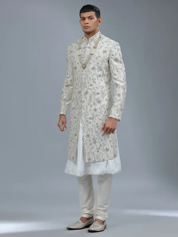Peshwai style off white raw silk shewani for groom
