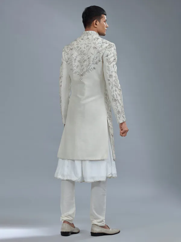 Peshwai style off white raw silk shewani for groom