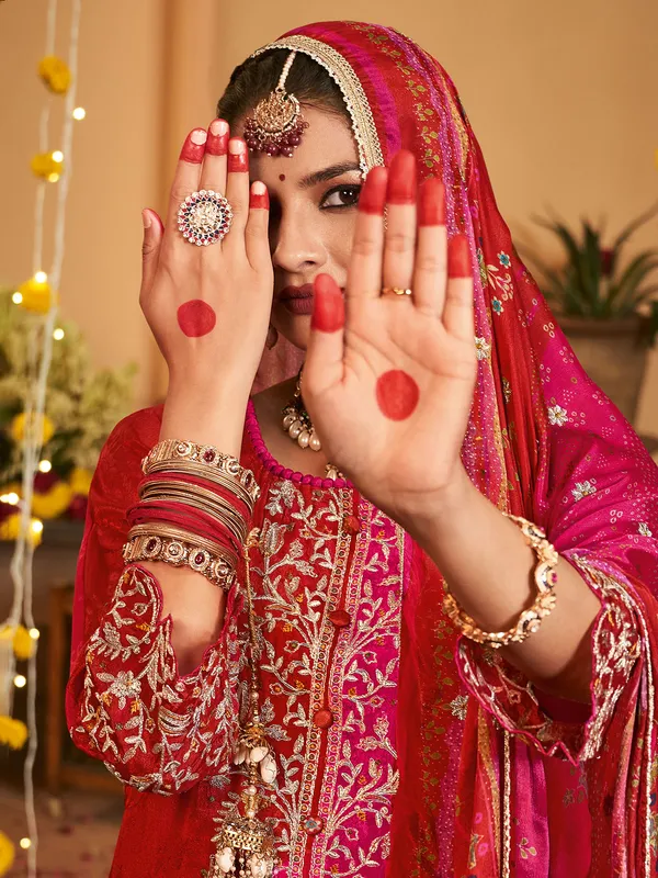 Pink and red silk salwar suit with resham work