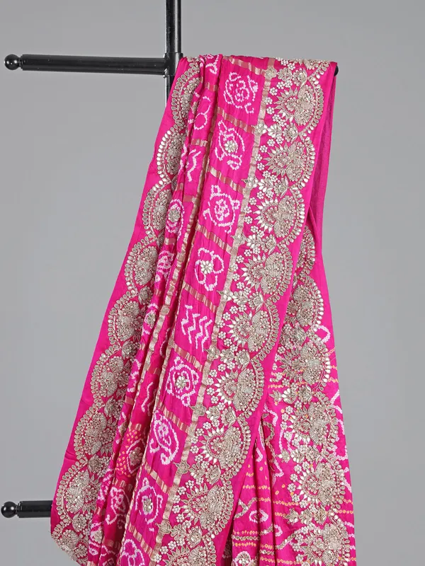 Pink bandhani saree with zardosi detailing
