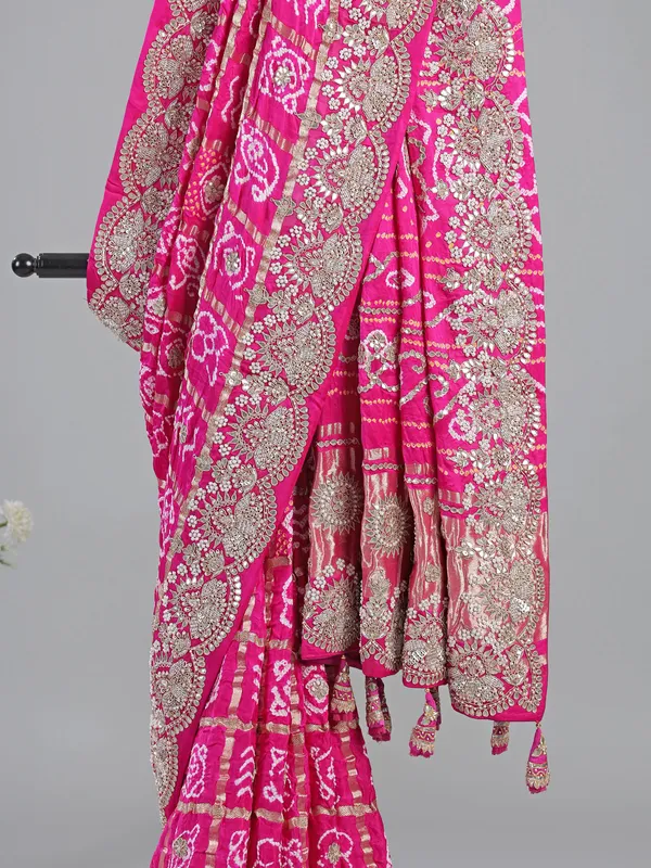 Pink bandhani saree with zardosi detailing