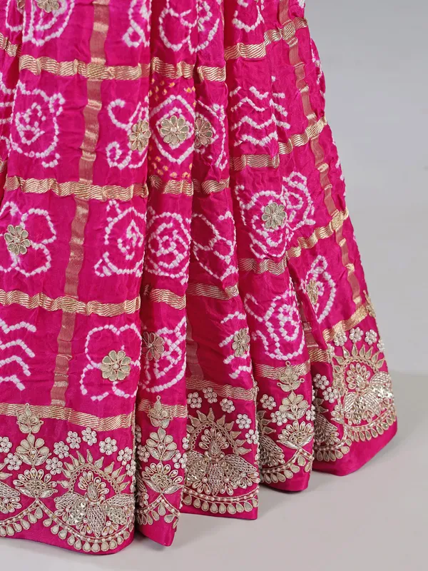 Pink bandhani saree with zardosi detailing
