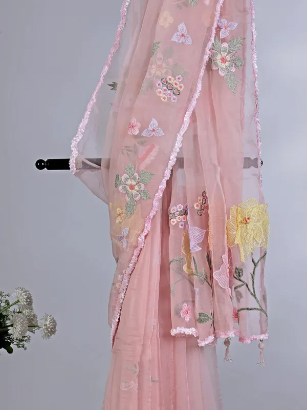 Pink embroidered organza saree for reception