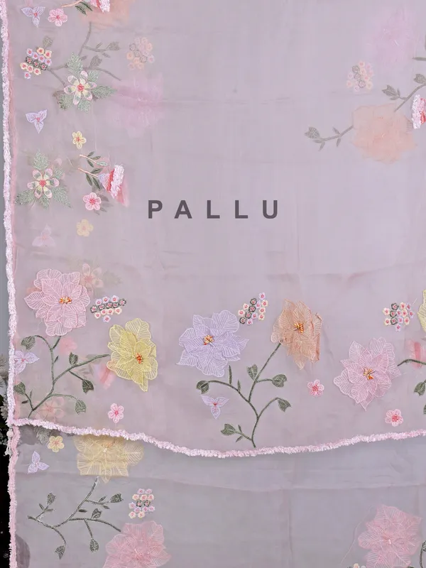 Pink embroidered organza saree for reception