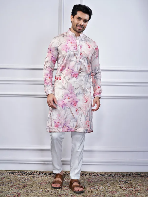 Pink floral printed cotton kurta suit for festive wear