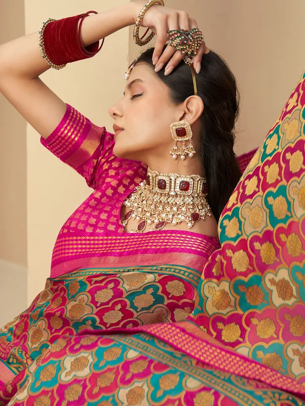 Pink georgette saree with gentle patterned design for festive wear