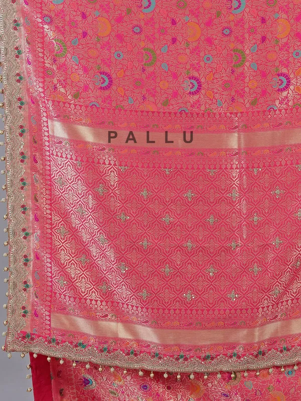 Pink kanjivaram silk saree with pearl and zardosi charm