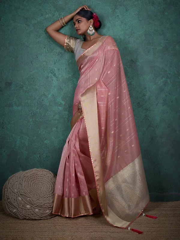 Pink linen blend saree with zari woven detailing