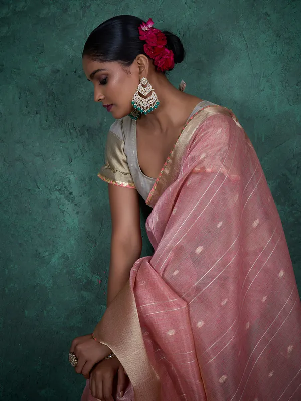 Pink linen blend saree with zari woven detailing