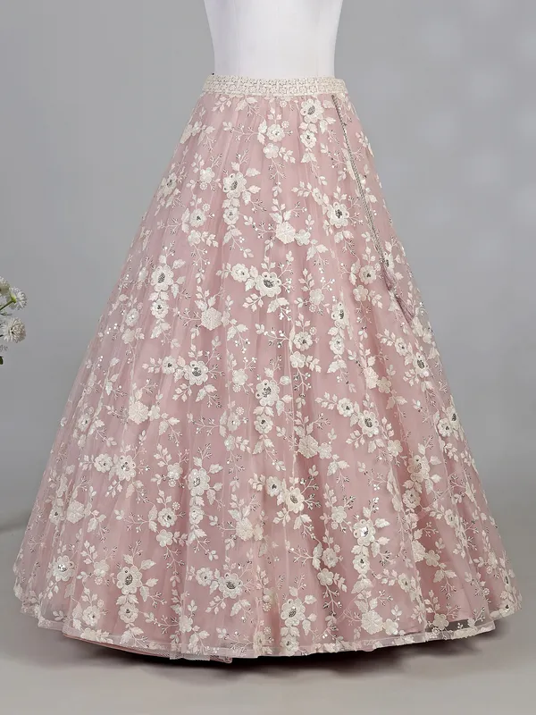 Pink net lehenga choli with sequins and thread work