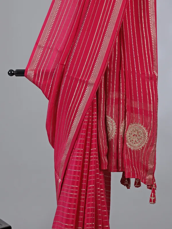 Pink organza saree with elegant zari weaving