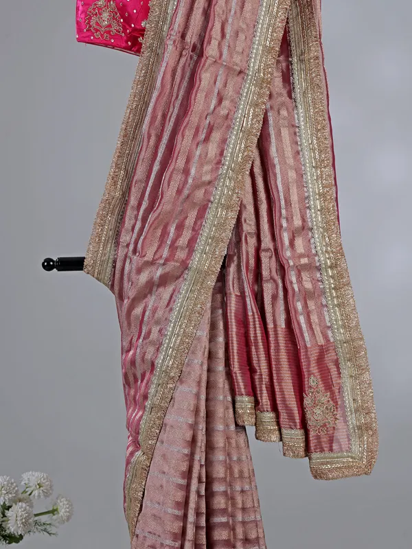 Pink organza saree with mirror and aabla work