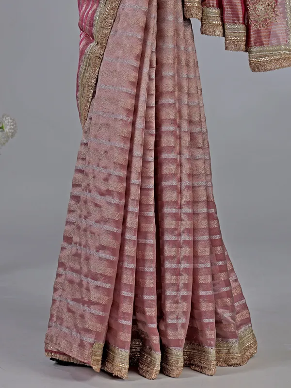 Pink organza saree with mirror and aabla work
