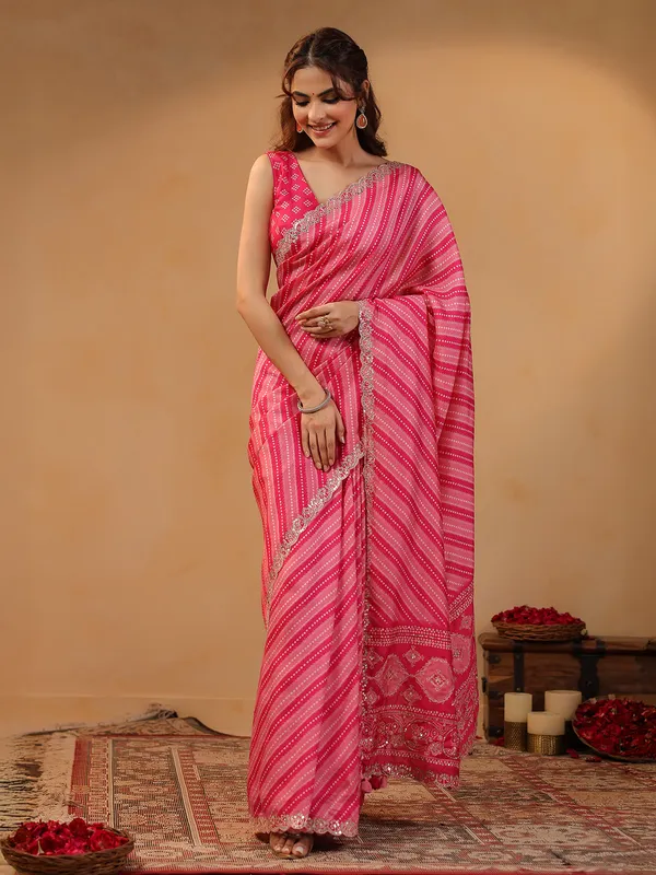 Pink printed silk saree with aabla highlights
