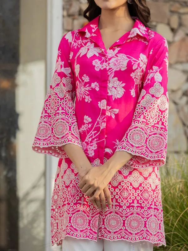 Pink printed suit with delicate cutout detailing