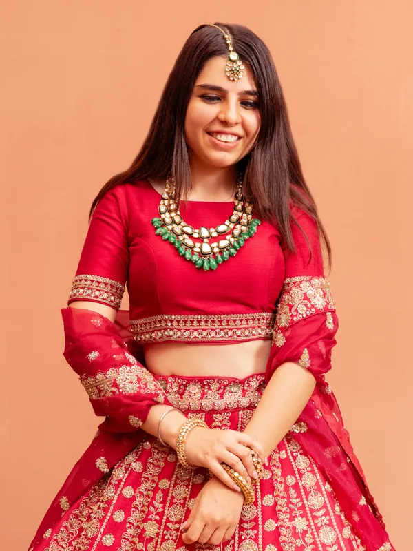 Pink raw silk bridal lehenga choli with boat neckline