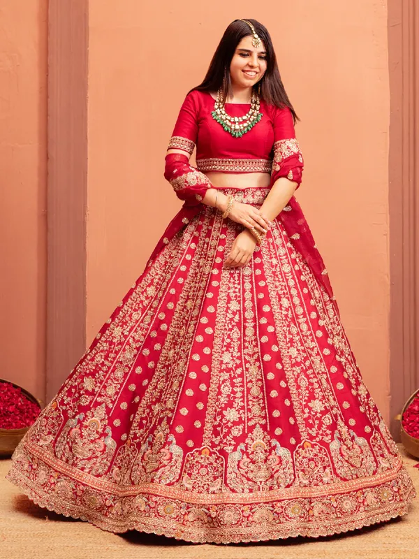 Pink raw silk bridal lehenga choli with boat neckline